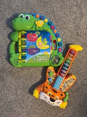 Interactive activity book and toy guitar
